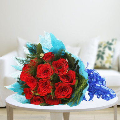 10 Red Roses in Blue Paper Packing